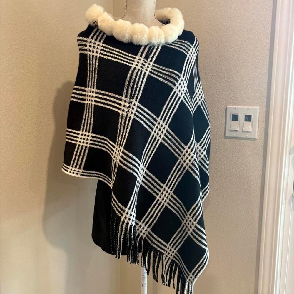 Dashing black and white plaid poncho. One size